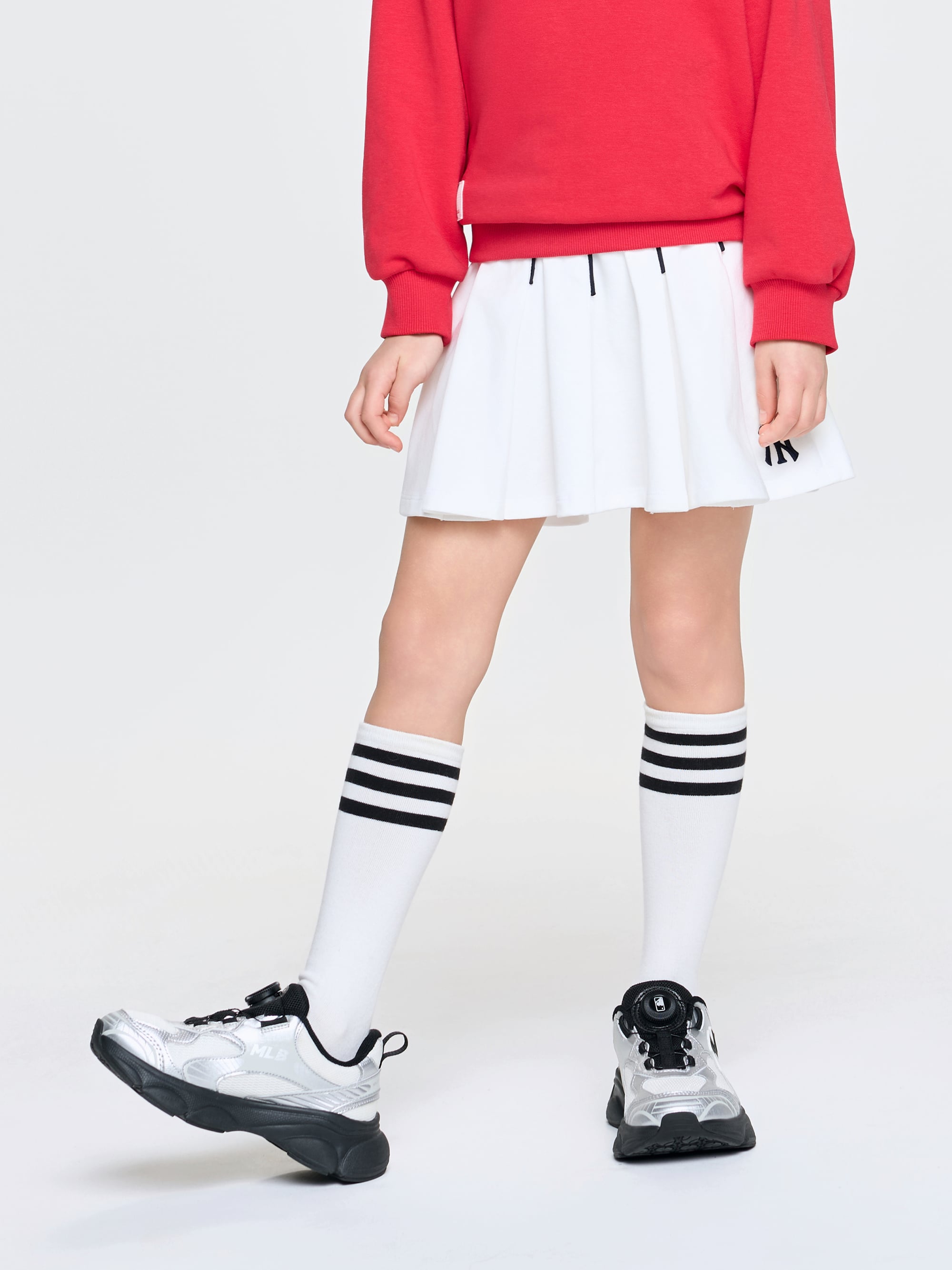 VARSITY SPORTIVE PLEATS SKIRT