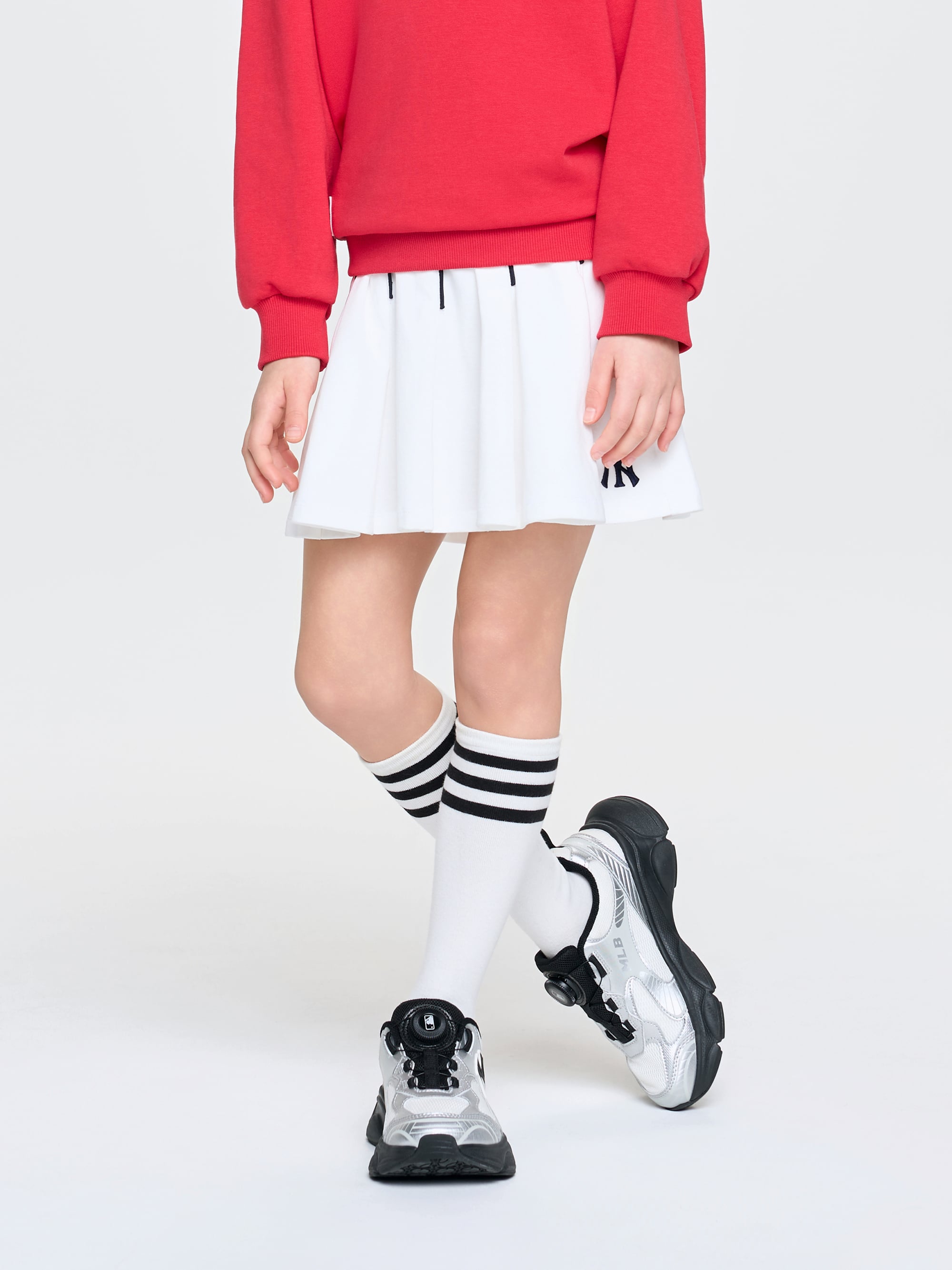 VARSITY SPORTIVE PLEATS SKIRT