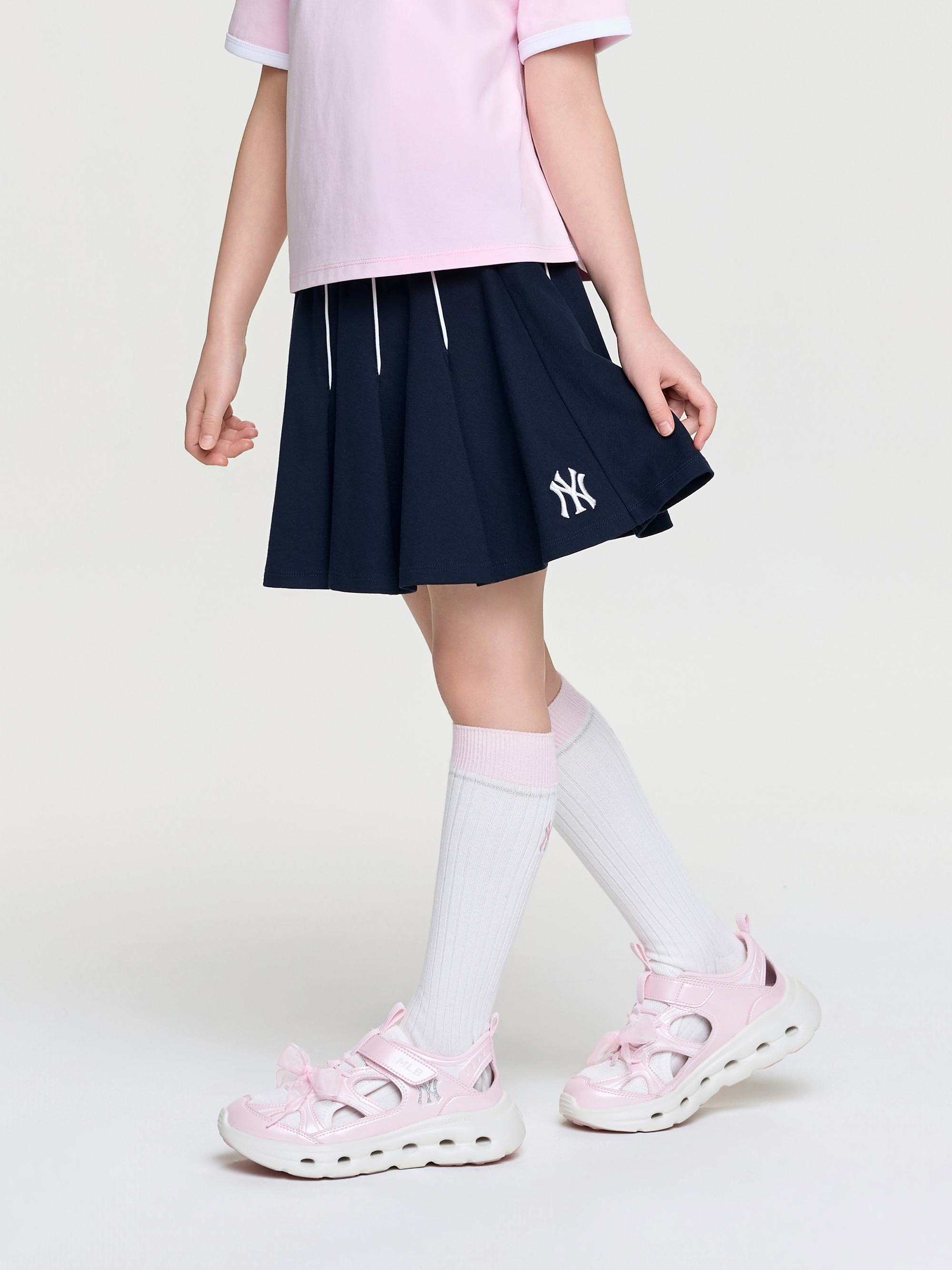 VARSITY SPORTIVE PLEATS SKIRT