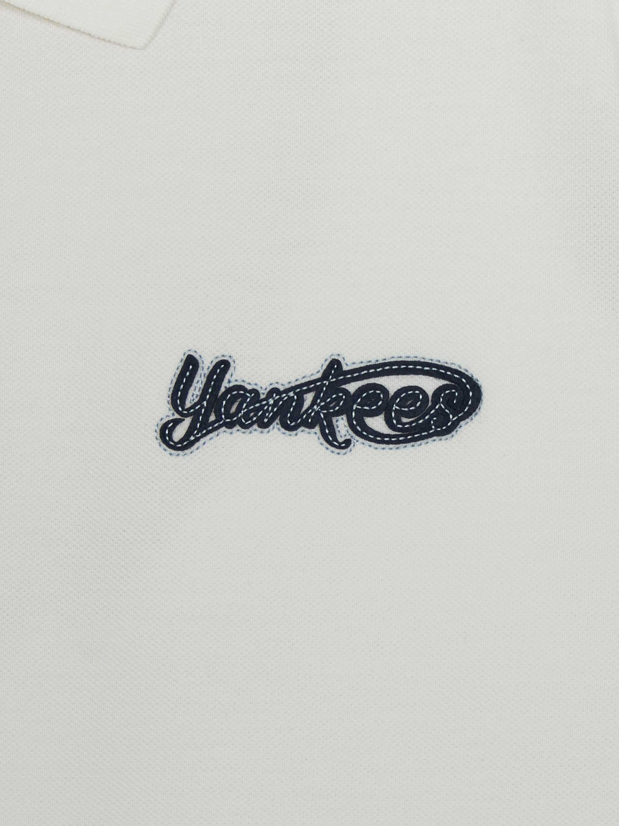 Varsity Small Cursive Over Fit Polo T-Shirts