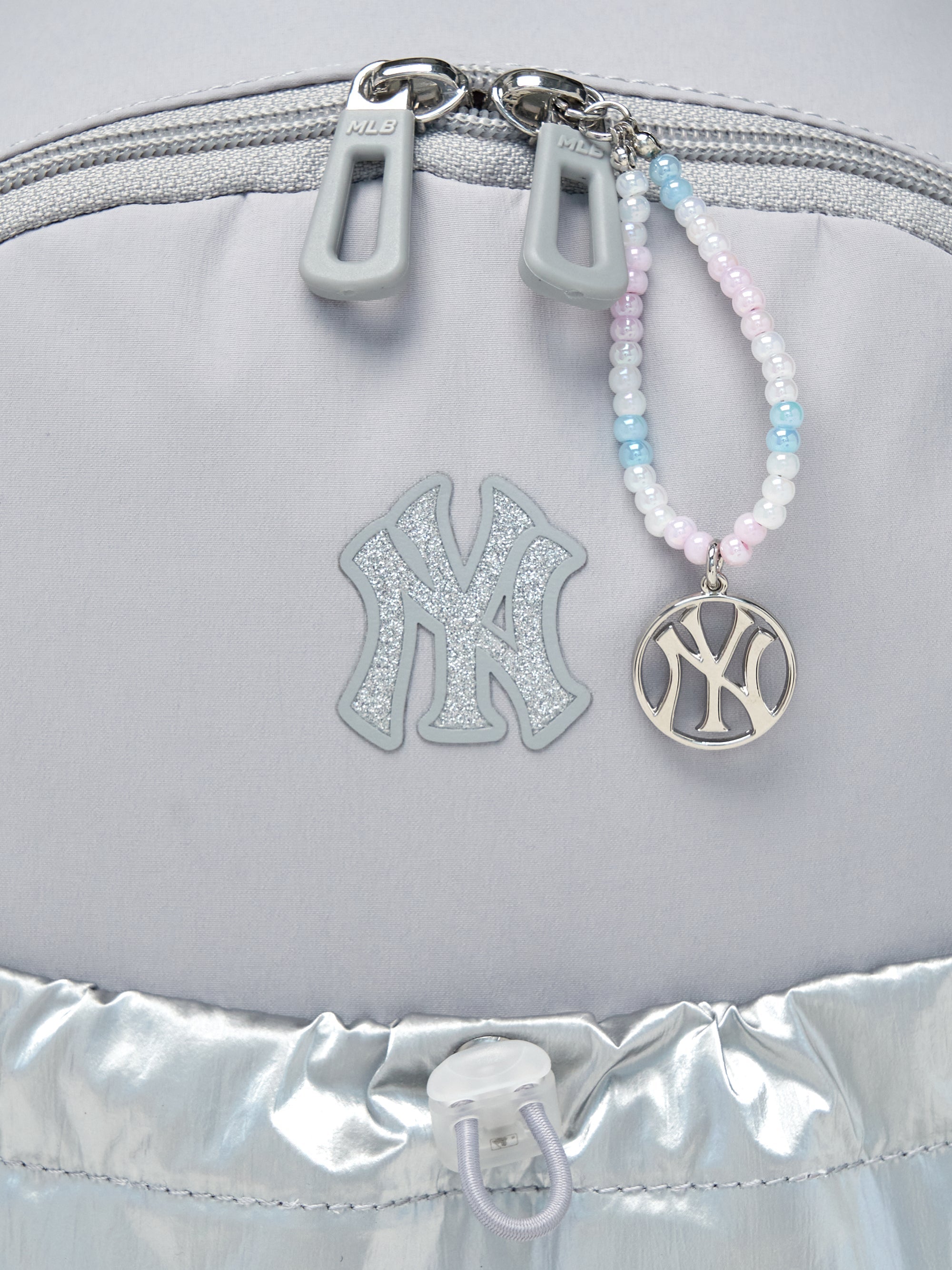 GLOSSY STRING BACKPACK