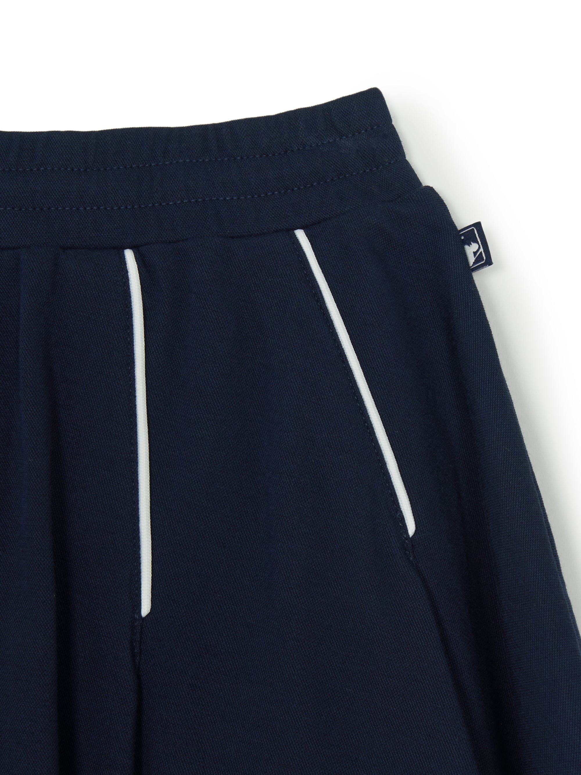 VARSITY SPORTIVE PLEATS SKIRT